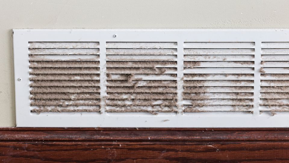 A Close-up of A Dirty Air Duct, Indicating The Need For Cleaning